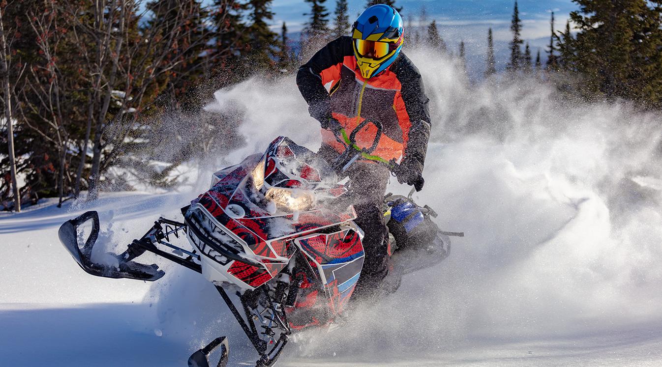All the Best Places to Go Snowmobile Riding in the U.S.